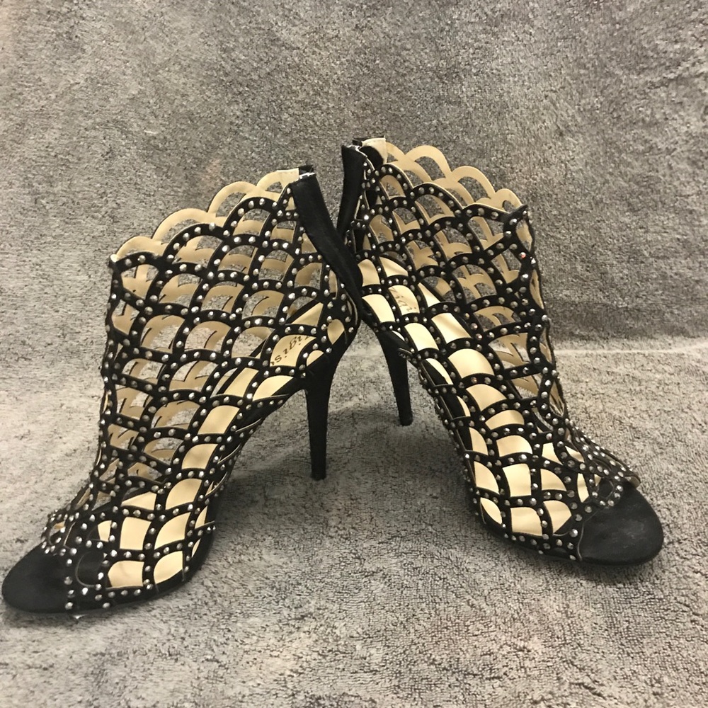Brand new Zigisoho cut out high heel, zipper back